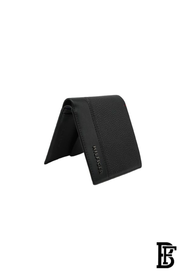 Tommy Hilfiger Wallet is a one to face solid style covered in light/black leather - Image 5
