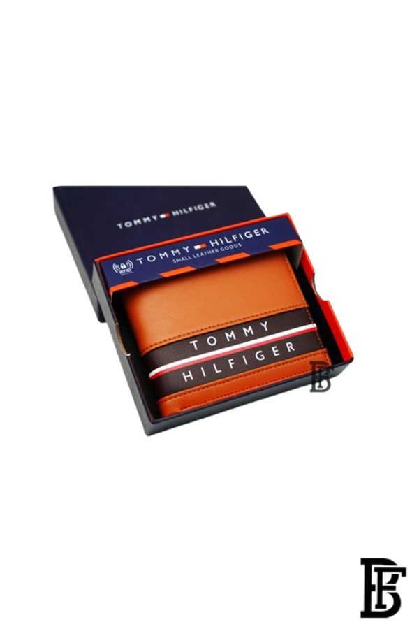 Tommy Hilfiger Wallet is a one to face solid style covered in light/BROWN leather