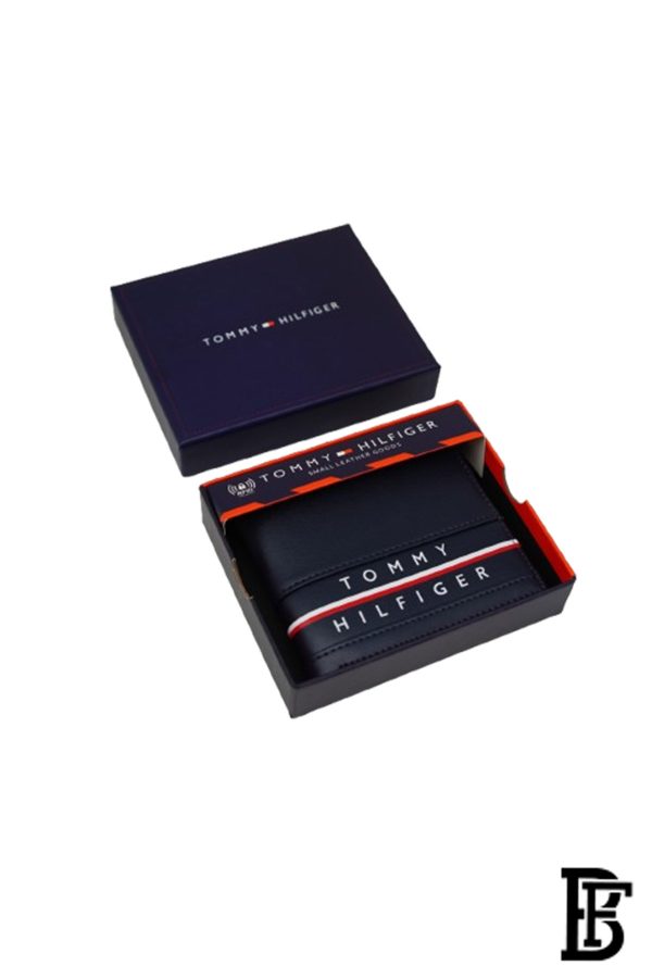 Tommy Hilfiger Wallet is a one to face solid style covered in light/BLUE leather