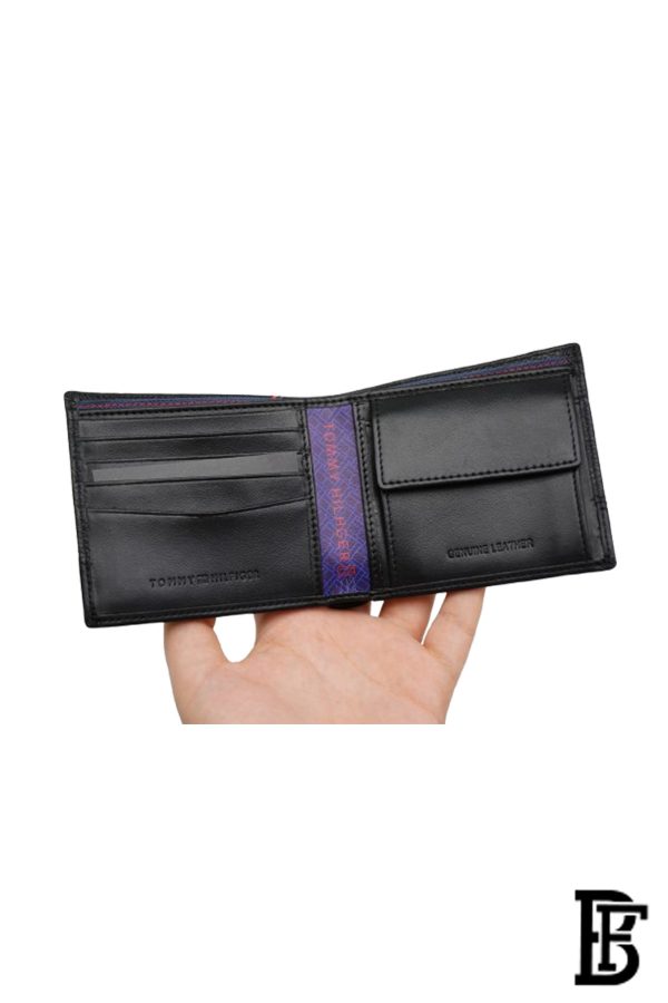 Tommy Hilfiger Wallet is a one to face solid style covered in light/black leather - Image 7