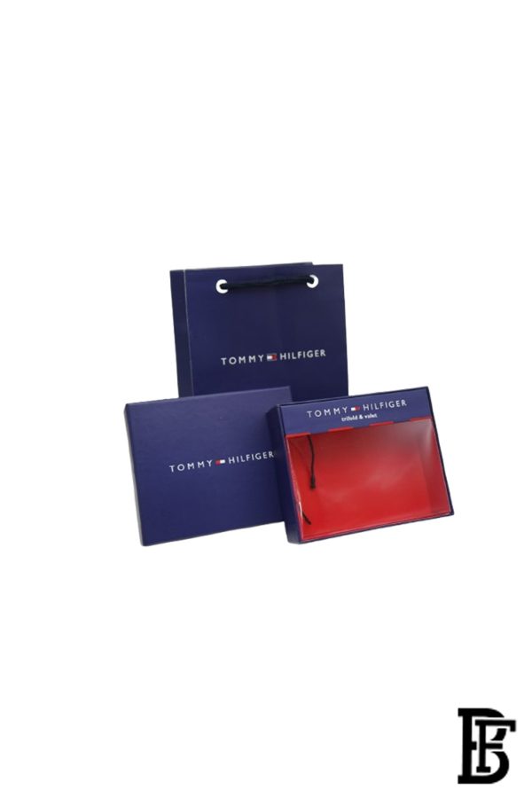 Tommy Hilfiger Wallet is a one to face solid style covered in light/black leather - Image 10