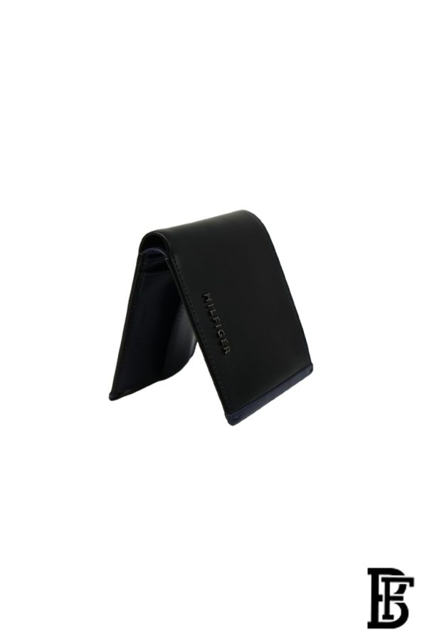 Tommy Hilfiger Wallet is a one to face solid style covered in light/black leather - Image 5