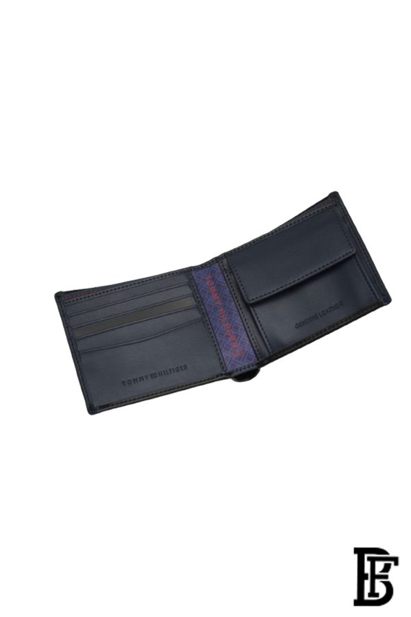 Tommy Hilfiger Wallet is a one to face solid style covered in light/black leather - Image 8