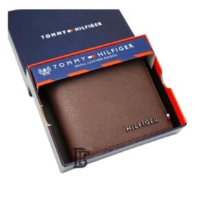 Tommy Hilfiger wallet is a one to face solid style covered in light/BROWN leather