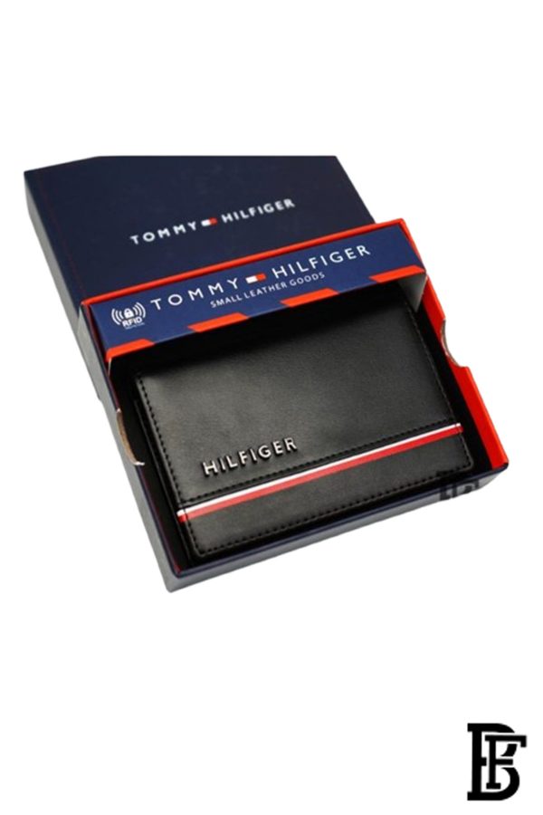 Tommy Hilfiger wallet is a one to face solid style covered in light/black leather