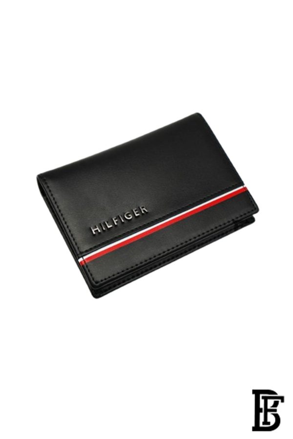 Tommy Hilfiger wallet is a one to face solid style covered in light/black leather - Image 3
