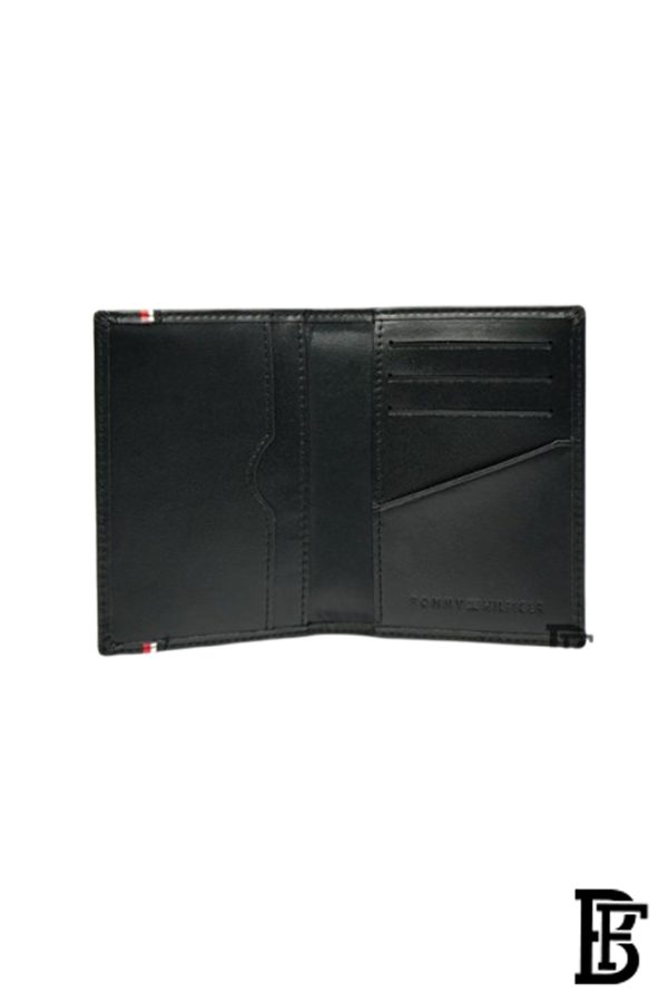 Tommy Hilfiger wallet is a one to face solid style covered in light/black leather - Image 4