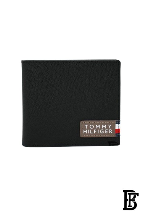 Tommy Hilfiger Wallet is a one to face solid style covered in light/black leather - Image 2