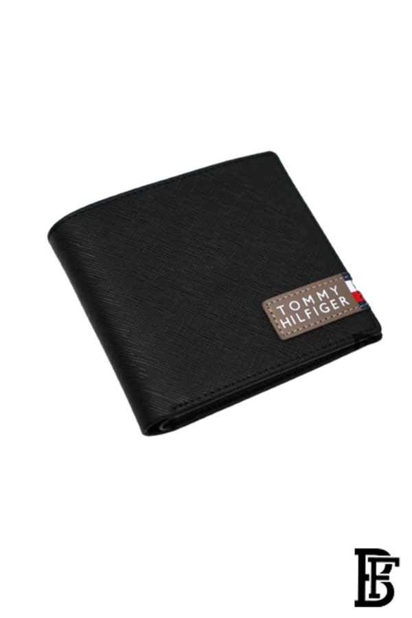 Tommy Hilfiger Wallet is a one to face solid style covered in light/black leather - Image 3