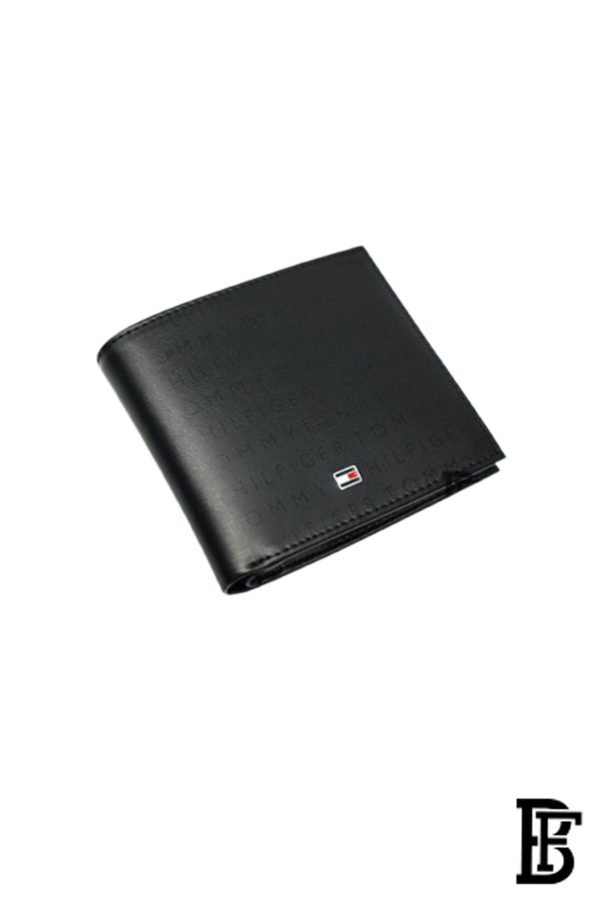 Tommy Hilfiger Wallet is a one to face solid style covered in light/black leather - Image 2