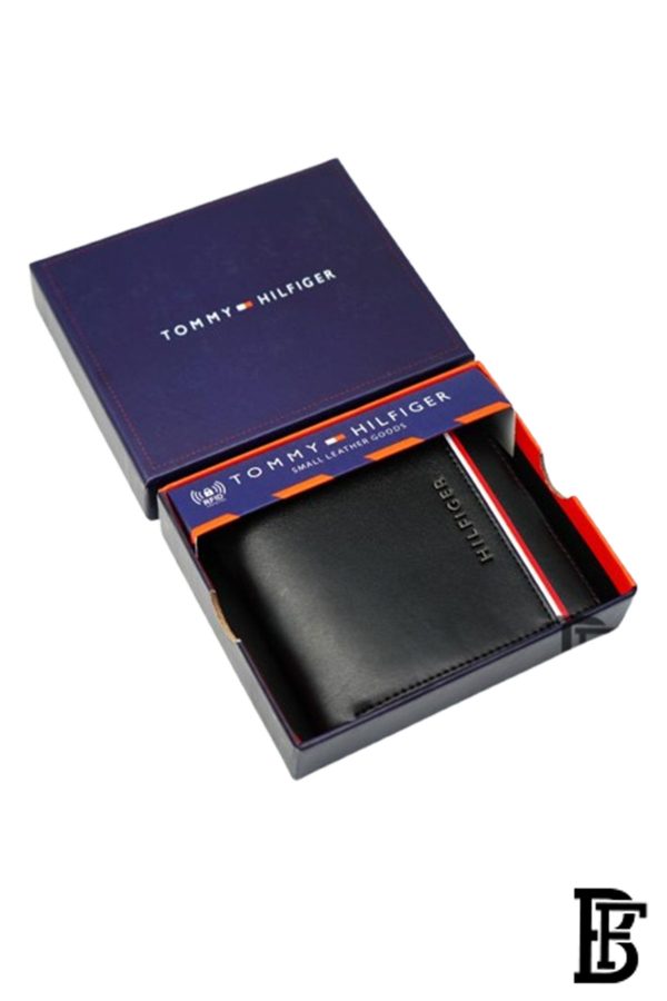 Tommy Hilfiger wallet is a one to face solid style covered in light/black leather