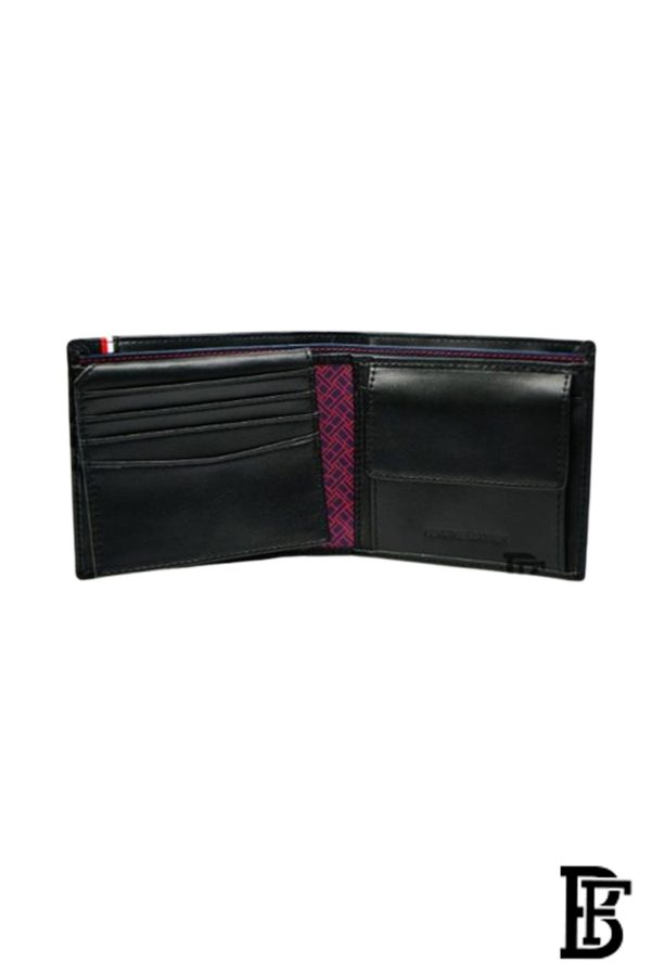 Tommy Hilfiger wallet is a one to face solid style covered in light/black leather - Image 3